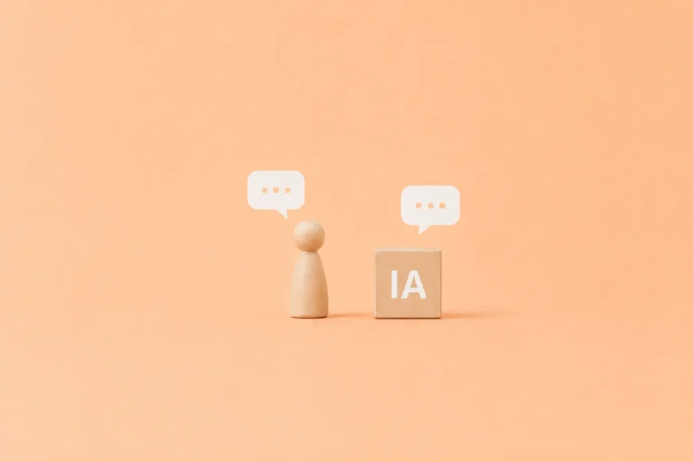 Illustration d'un pion et d'un cube en bois illustrant l'intelligence artificielle dans un dialogue relevant d'un processus de recrutement.