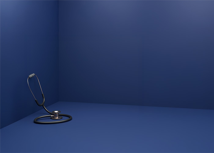 Stéthoscope dans un coin illustrant la fragmentation entre santé-prévoyance et systèmes de paie en entreprise