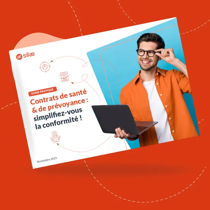 Visuel du guide pratique sur les contrats de santé et de prévoyance, avec un professionnel souriant tenant un ordinateur
